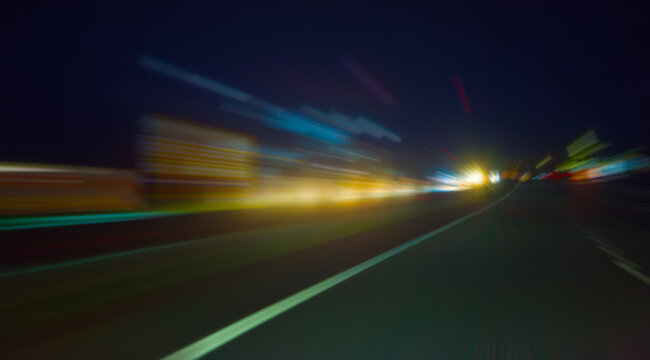 Traffic on night road © Yuri Bizgaimer