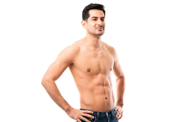 Hispanic confident male model with muscular body