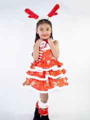 Merry Christmas girl Wearing Santa claus suit on white background