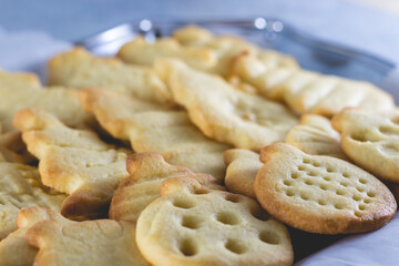 Tasty homemade Christmas cookies on blue plate