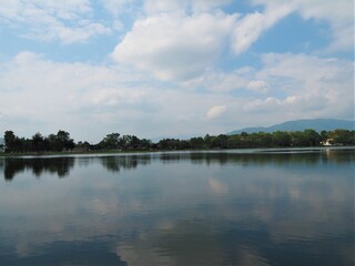 Blue sky with clouds over the river