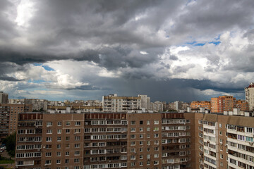 The cityscape with cloud over a city Moscow, Russia