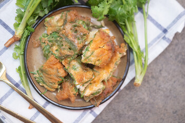 Omelet with Climbing Wattle. Traditional Thai style food