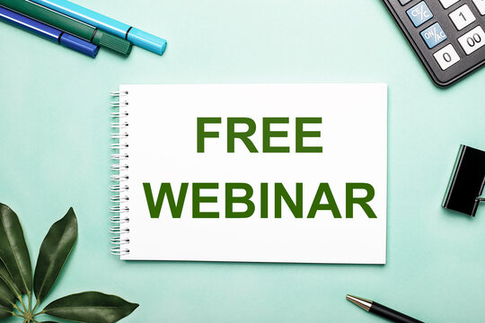 FREE WEBINAR is written on a white sheet on a blue background near the stationery and the sheffler sheet. Call to action.