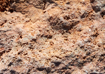 Textured stone, sandstone, limestone surface. Close image. Stone, natural abstract texture for backgrounds. Close up.  architecture.