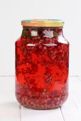 glass jar with currant