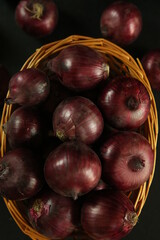 sweet red onions on background