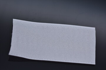 white Velcro tape isolated on black