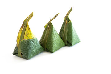 banana leaf wrapped Thai dessert isolated on white