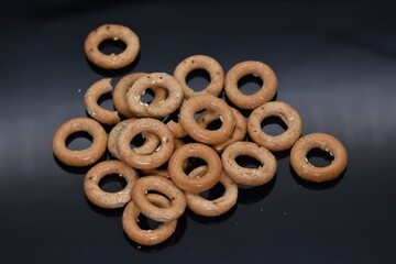 Pretzels crackers bagels  with wine,crispy goodies with lemon and pepper