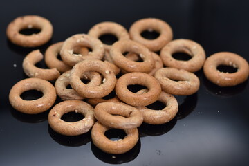 Pretzels crackers bagels  with wine,crispy goodies with lemon and pepper