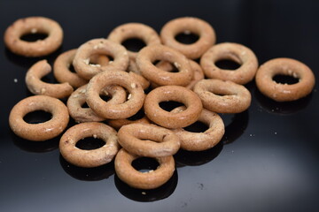 Pretzels crackers bagels  with wine,crispy goodies with lemon and pepper