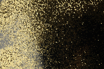 Gold (bronze) glitter shine dots confetti on black. Abstract light blink sparkle horizontal backgound.