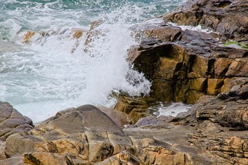 waves crashing on rocks