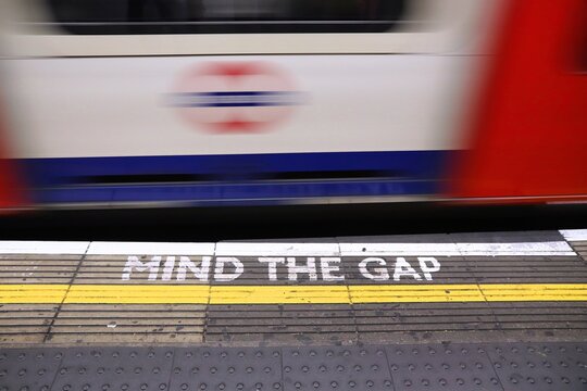 LONDON, UK - JULY 13, 2019: Mind The Gap warning at London Underground station. London Underground is the 11th busiest metro system worldwide with 1.1 billion annual rides.