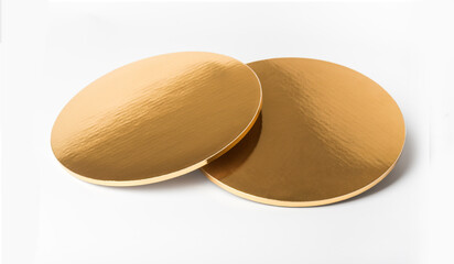 Golden plastic round tray isolated over white background