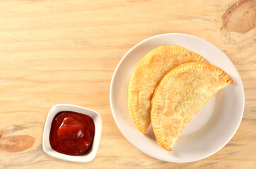 homemade pastry with tomato sauce