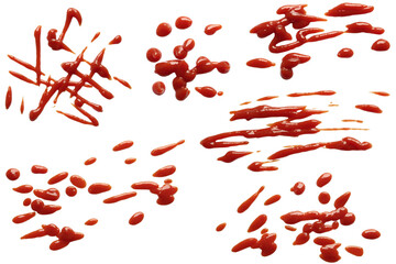 some liquid ketchup stains on white background
