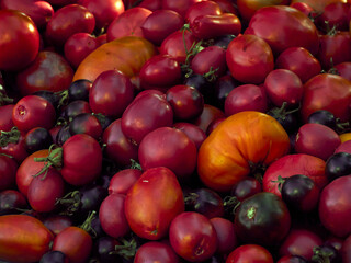 Background with ripe red tomatoes..
