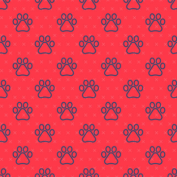 Blue line Paw print icon isolated seamless pattern on red background. Dog or cat paw print. Animal track. Vector.