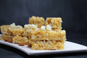 Gond ke ladoo/gond pak or Dinka che ladoo is winter special Indian sweet made from edible...