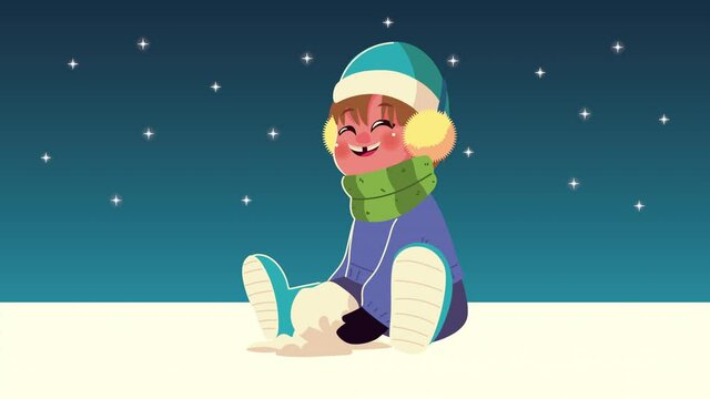little boy wearing winter clothes seated playing with snowball in the snowscape scene