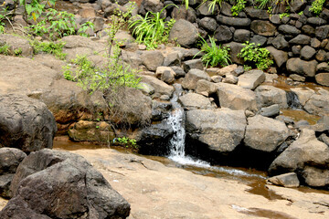 areal view of Small waterfall ,Water is coming out of small rock