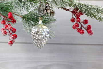 Old soviet decoration on the Christmas tree, glass toy strawberry close up on light background