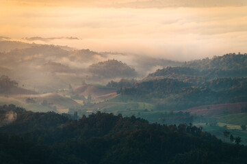 Fototapeta premium Beautiful sunrise mountain range in Tha Song Yang district located in Tak province, Thailand