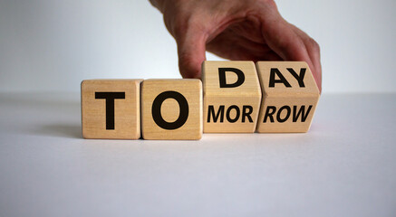 Do it today, not tomorrow. Male hand flips wooden cubes and changes the word 'tomorrow' to 'today'. Beautiful white background, copy space. Business and tomorrow or today concept. - obrazy, fototapety, plakaty