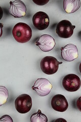 sweet red onions on background