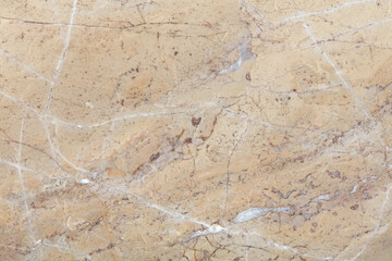 Beige stone texture background with white veins and scratches