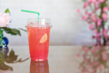 Refreshing fruit punch beverage in glass. Mixed cocktails, party punch  and frozen summer drinks.
