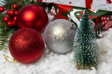 Fototapeta na wymiar christmas tree toys and gifts on a white background
