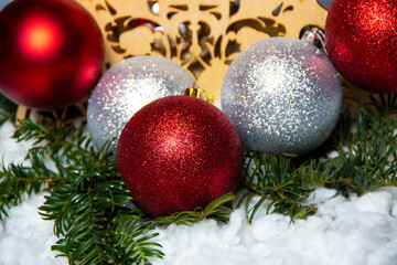 red and silver christmas tree toys and gifts on a silver background