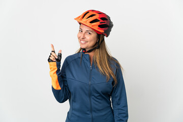 Middle age cyclist woman isolated on white background showing and lifting a finger in sign of the best
