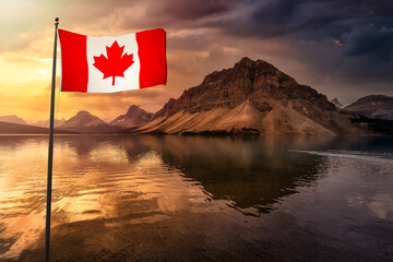 Canadian National Flag. Beautiful Nature landscape view of Bow Lake in Banff National Park, Alberta, Canada. Dramatic Colorful Stormy Sky. Scenic Background