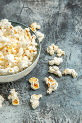 front view fresh popcorn for movie on a light background snack rusk cips