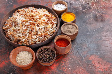 top view cooked rice with seasonings on dark desk meal photo dish food dark