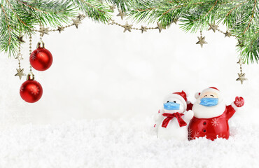 Santa Claus and snowman with spruce twigs and fistive decorations on white bokeh background with snowflakes frame for New Year and Christmas
