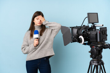 Young reporter woman holding a microphone and reporting news covering eyes by hands