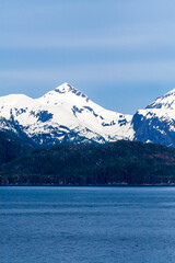 Snow-capped mountains along the coast of southern Alaska