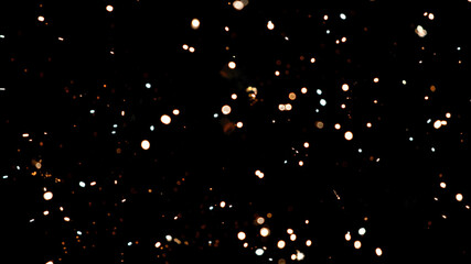 Fireworks background with blurred lights on black background