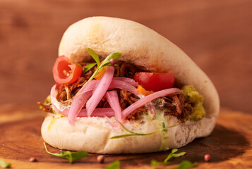 Gua bao, steamed buns with pork belly and vegetable. Asian cuisine