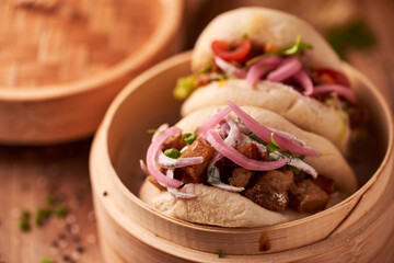 Gua bao, steamed buns with pork belly and vegetable. Asian cuisine
