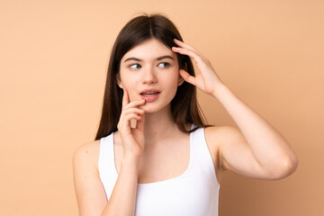 Young Ukrainian teenager girl over isolated background . Portrait