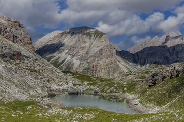 View of Crespeina lake, located west of Gardenacia plateau, as seen on High Route #2 from Puez refuge to Gardena valley, Puez-Odle Nature park, Dolomites, South Tirol, Italy.