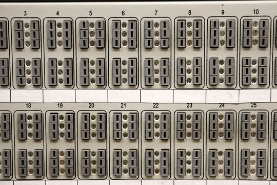 Telecommunication cross patch panel telephone exchange