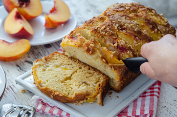 Delicious cake with peaches .