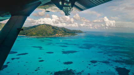 Seychelles plane view between isles on a sunny day